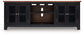 Wildenauer - Brown / Black - XL TV Stand With Fireplace Option